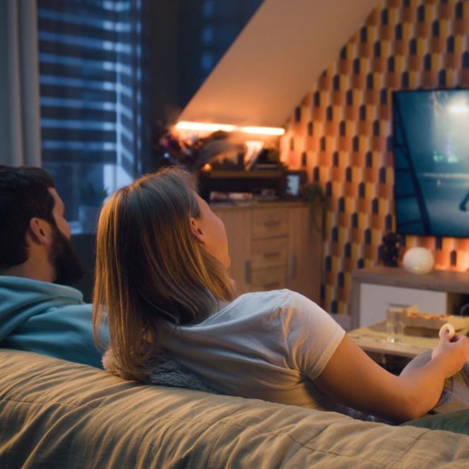 couple resting for movie night