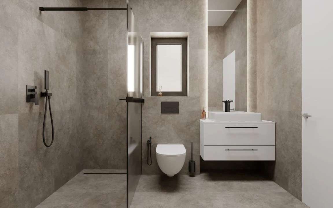 Stylish bathroom with walk-in shower, black matte fixtures, and floating white vanity