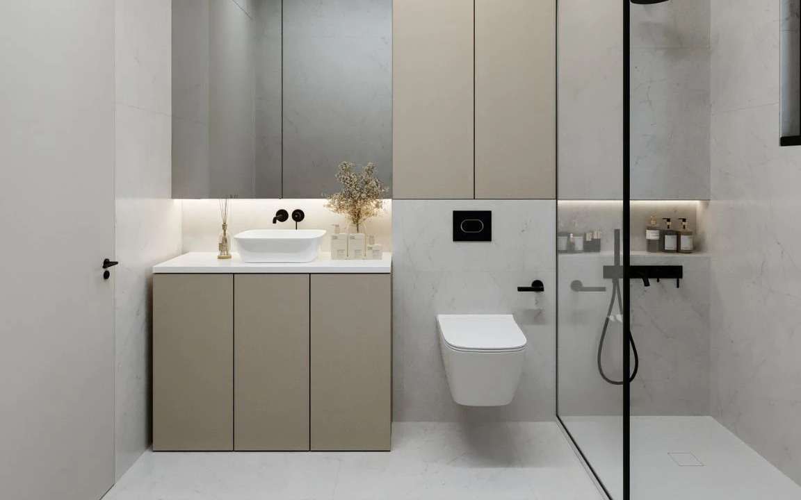 view of the stylish bathroom in beige modular house, highlighting modern fixtures