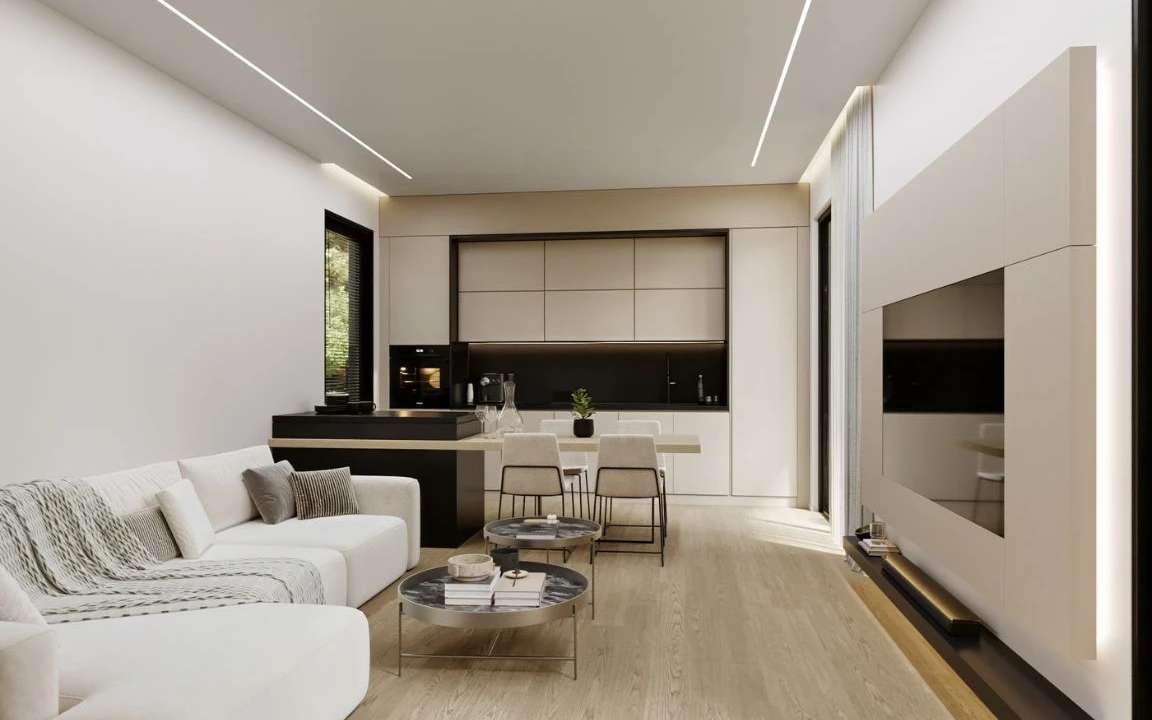 View of the kitchen and living room design in a beige modular house