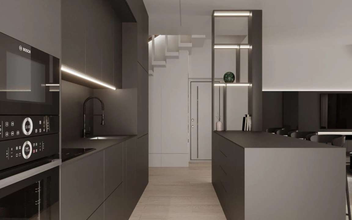 Kitchen and island bar with staircase as background