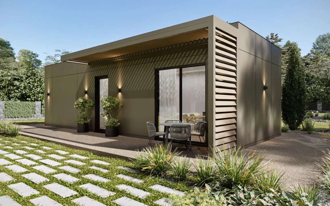 Contemporary front right exterior of the MD54 modular house in beige, highlighting its clean lines and seamless integration with the surrounding landscape.