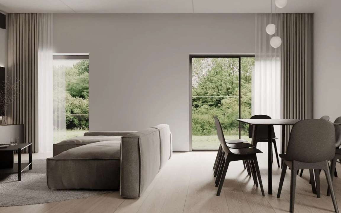 Living room on the left and dining area on the right