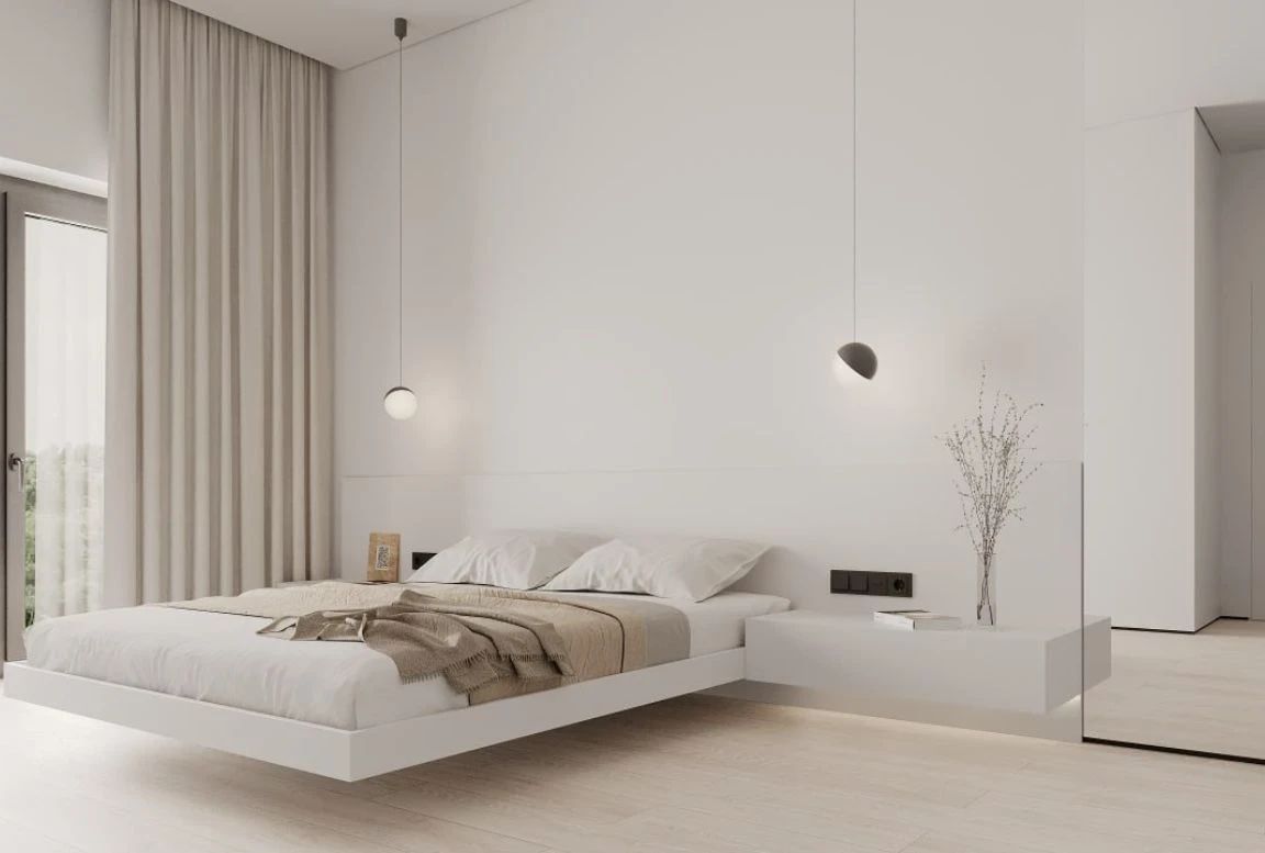 Minimalist bedroom with floating bed, pendant lights, and built-in nightstands
