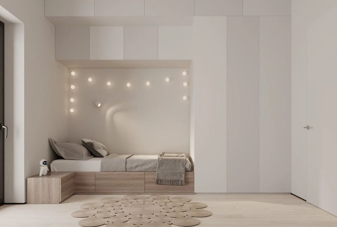 Cozy child’s bedroom with fairy lights, built-in storage, and wood platform bed