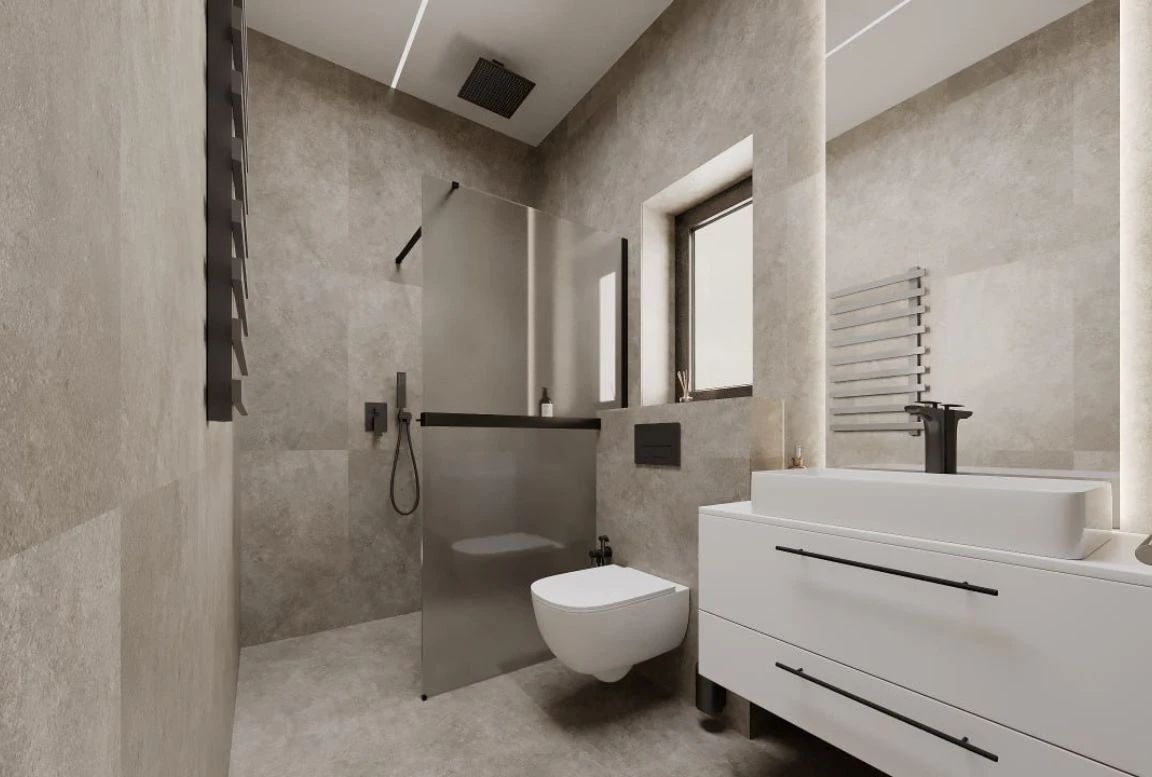 Ensuite bathroom with stone-look tiles, wall-mounted toilet, and black matte fixtures
