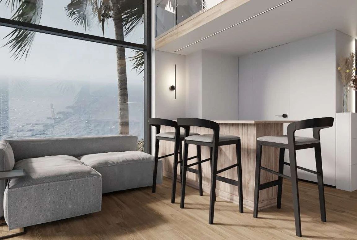 Modern kitchen setup in the  modular house with wood accents and ocean view