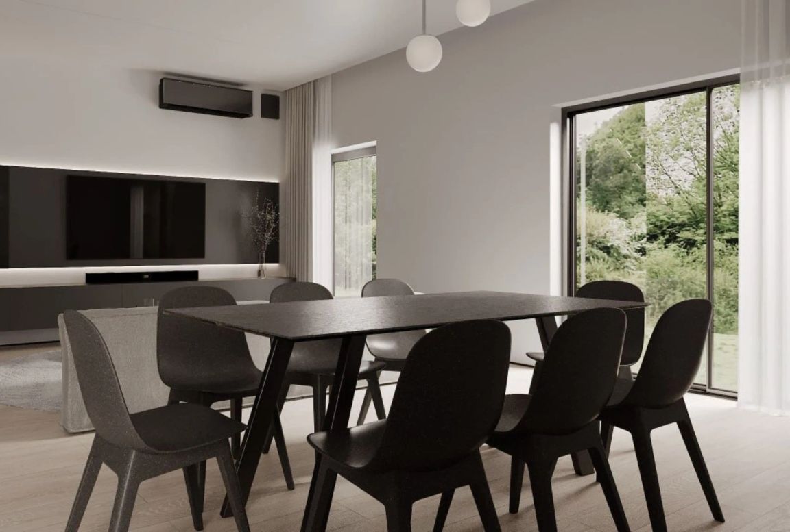 Dining area with the living room as background