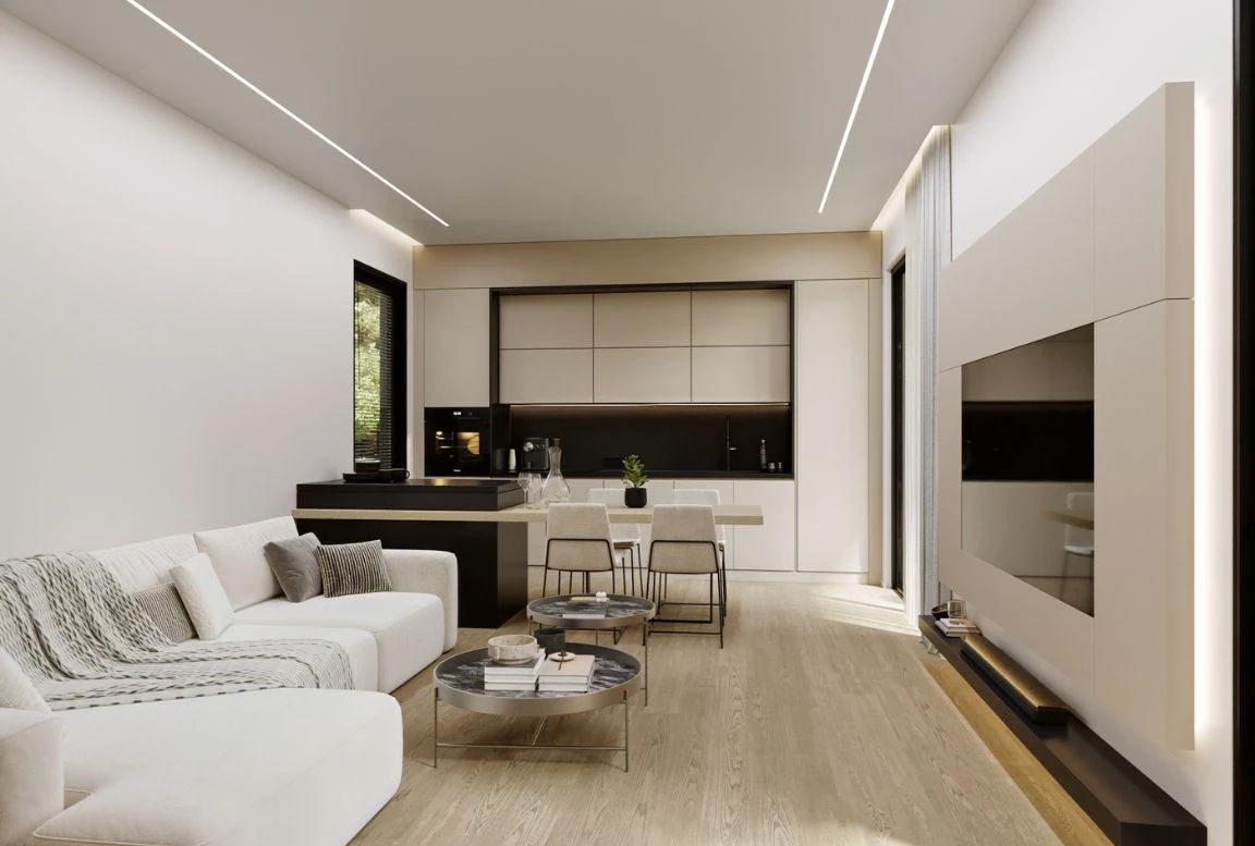 View of the kitchen and living room design in a beige modular house