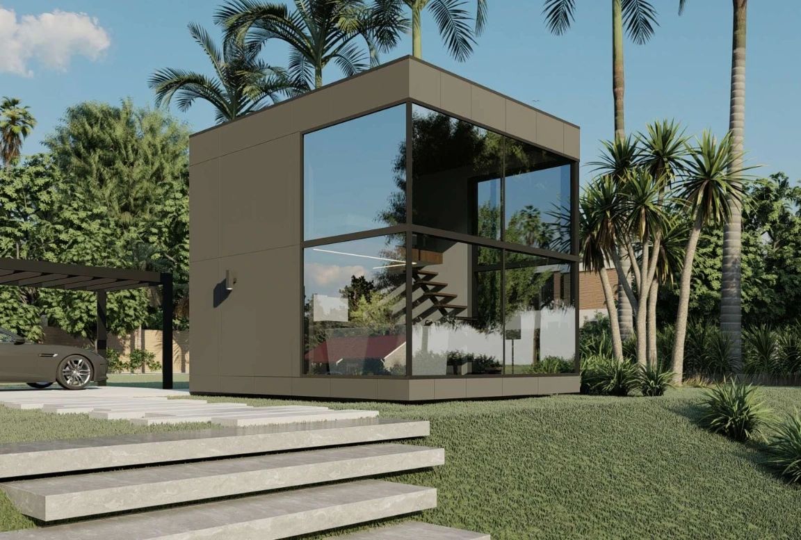 Exterior view of the MD50 modular house with large glass windows