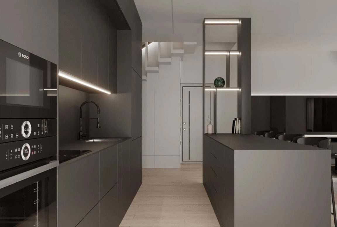 Kitchen and island bar with staircase as background