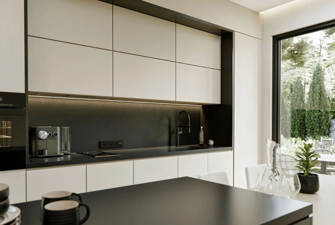 view of the modern kitchen in a beige modular house, featuring sleek cabinetry, contemporary appliances, and a functional layout for efficient cooking.