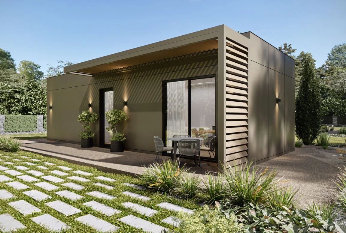 Contemporary front right exterior of the MD54 modular house in beige, highlighting its clean lines and seamless integration with the surrounding landscape.