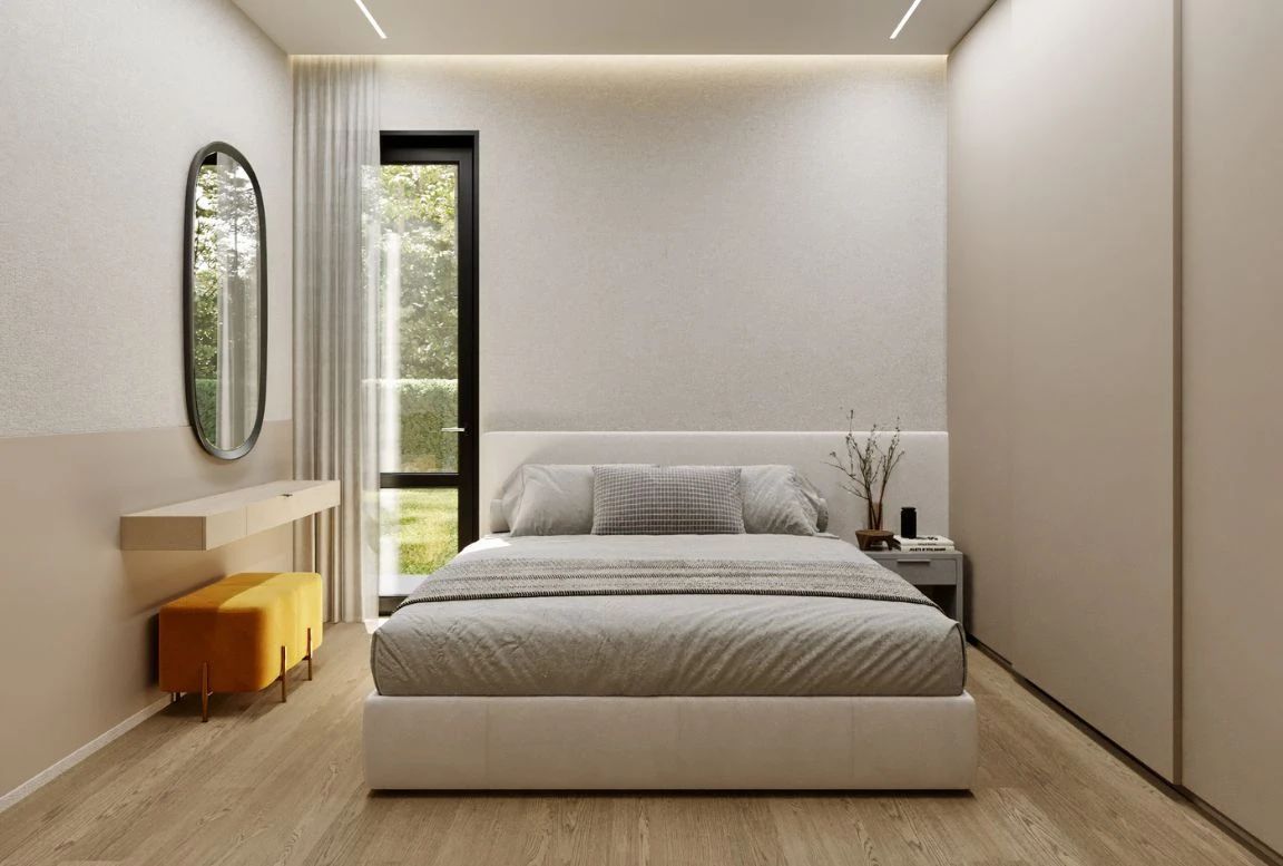 bedroom in a modular house featuring a minimalist design with a floating bed, elegant wooden accents, ambient lighting, and large windows for natural light.